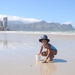 Un enfants sur la plage au Cap