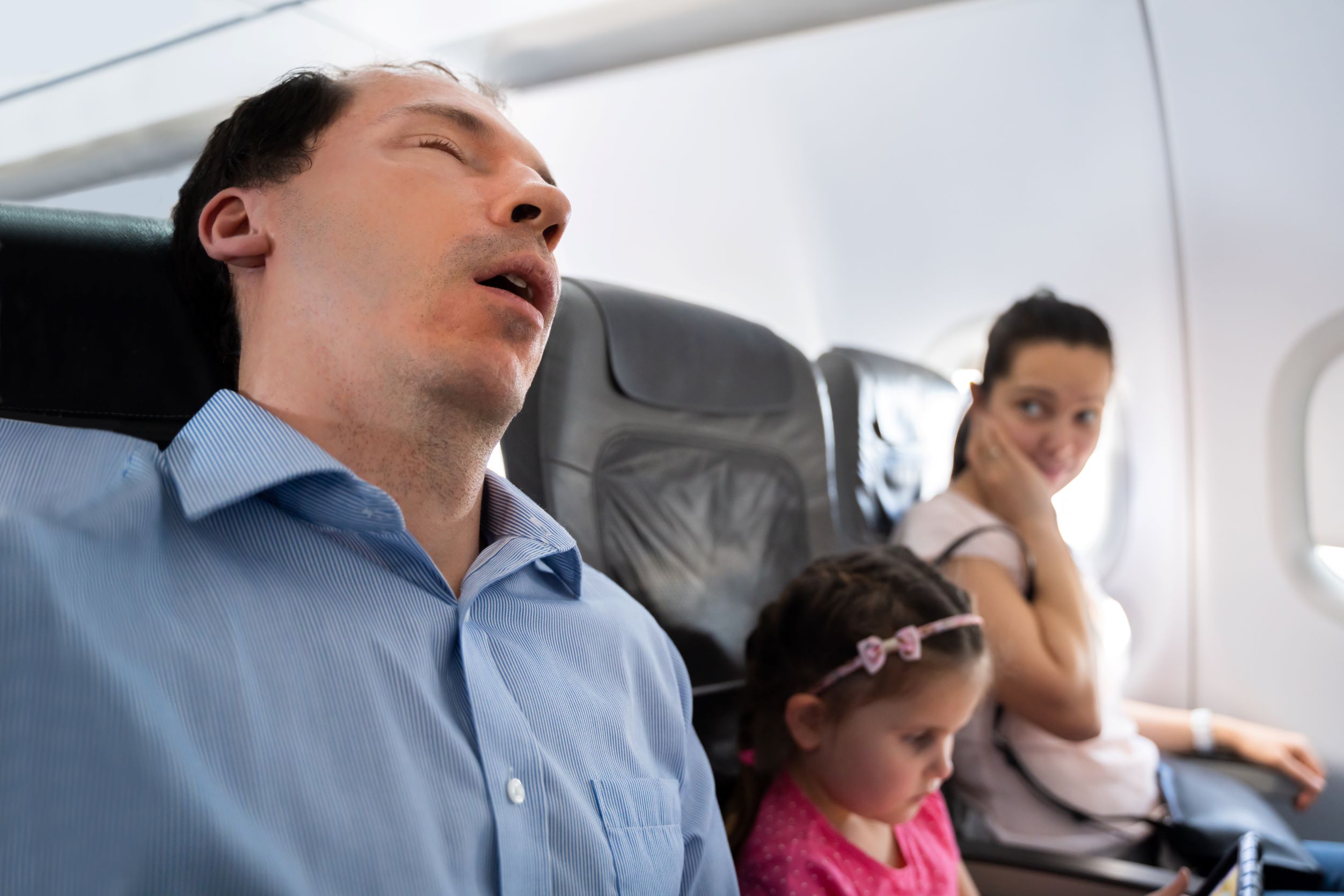 snoring man plane