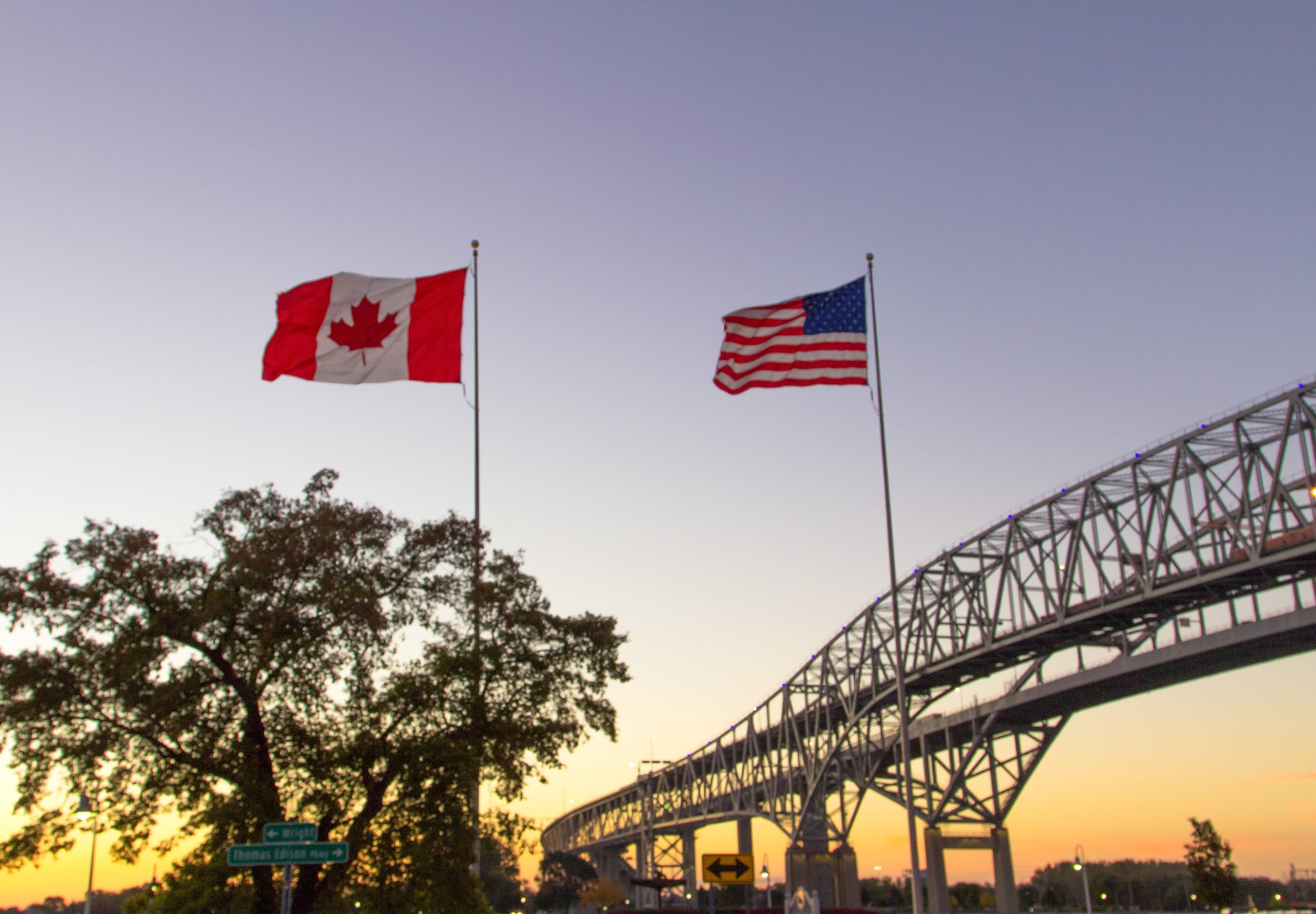 International Border Crossing. Sunset at the Blue Water Bridge border United States and Canada crossing. The bridge connects Port Huron, Michigan and Sarnia, Ontario.