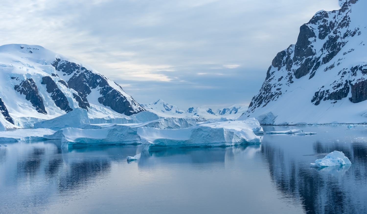 Crusing the Lemaire Channel among drifting icebergs, Antarctic Peninsula. Antarctica